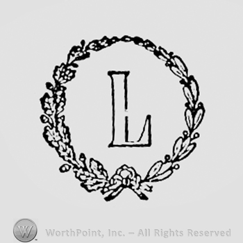 Letter L inside a circle formed by branches.