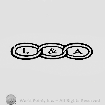 Three rings and letters L&A.
