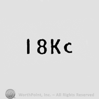 Number 18, letters KC.