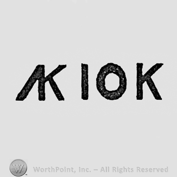 Monogram of letters AK, number 10 and letter k.