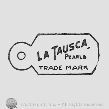 Words LA TAUSCA PEARLS TRADE MARK written on a label.