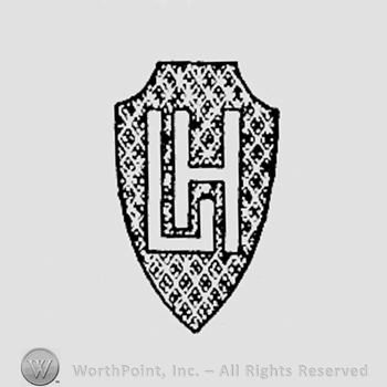 Letters LH on a shield.