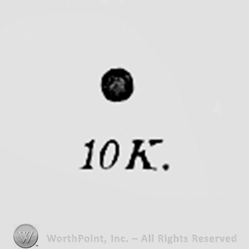 A point above number 10 and letter K.