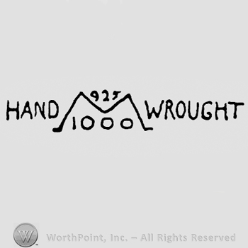 Words HAND WROUGHT, letter M, and numbers 1000, 925.