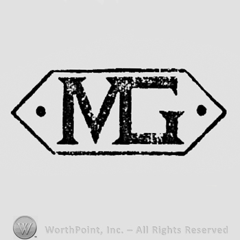 Monogram of letters M and G inside a shape like a diamond.