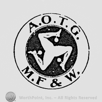 Three legs inside a circle; AOTG MF&W written on the edge.