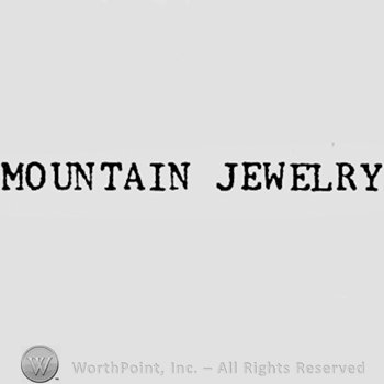 Words MOUNTAIN JEWELRY.
