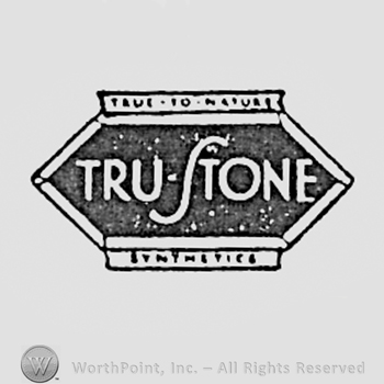 Words TRU-STONE inside a shape like a diamond.