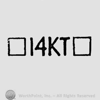 Two little squares, number 14 and letters KT.