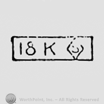 Number 18 and letter K next to an S inside a diamond; all inside a rectangle.