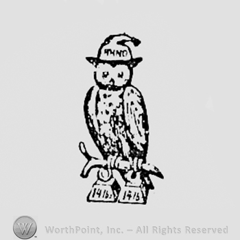 Owl on a branch, with hat and weights.
