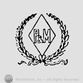 Letters P&m inside a diamond, all surrounded by branches.