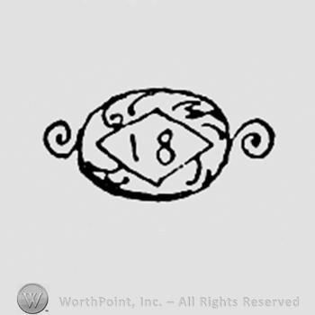 Number 18 inside a diamond with oval shape frame.