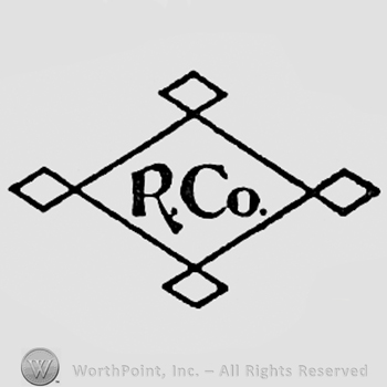 Letters R CO inside a shape like a diamond.