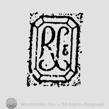 Monogram of letters B and R on a ring diamond.