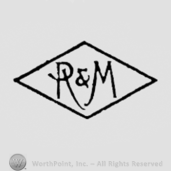 Letters R & M inside a diamond.