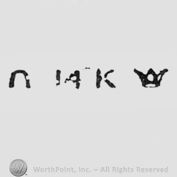 Letter N 14K and a crown.