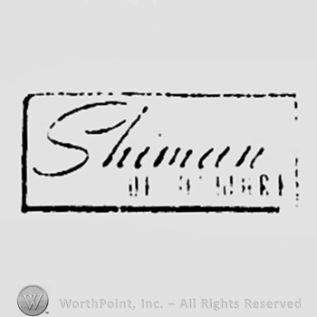 Words SHIMAN OF NEWARK written inside a rectangle.