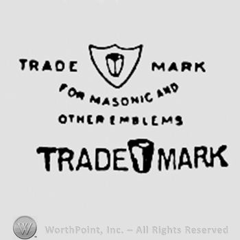 Shield with a mark; TRADE MARK written one side and another, and bellow.