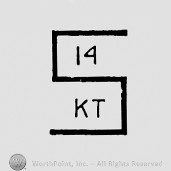 Letter S, number 14 and letters KT.