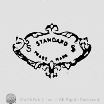 Words STANDARD TRADE MARK written inside a frame.