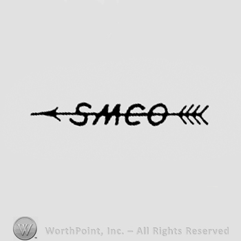 Letters SMCO pierced by an arrow.