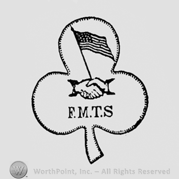 Two hands, a flag and letters F,M,T,S inside a clover.