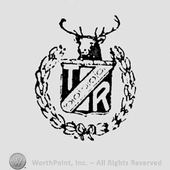 Letters R and T written on a shield with an animal head above.