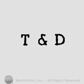 Letters T & D.