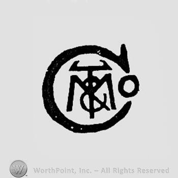 Monogram of letters T,M and CO.