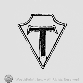 Letter T inside a diamond.
