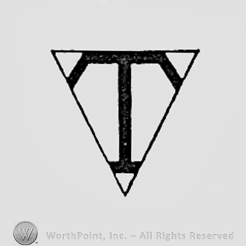 Letter T inside a diamond.