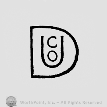 Letters CO inside letter U, all inside letter D.