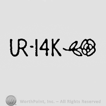 Letters UR 14K and a rose.