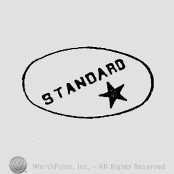 Word STANDARD and a star inside an aoval.