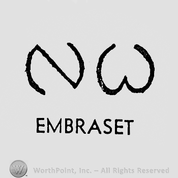 Letters N and W above word EMBRASET.