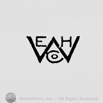 Letters E,H CO inside letter W.