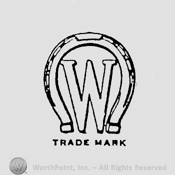 Letter W inside a horseshoe, and words TRADE MARK written bellow.