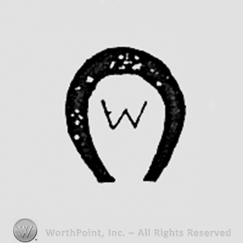 Letter W inside a horseshoe.