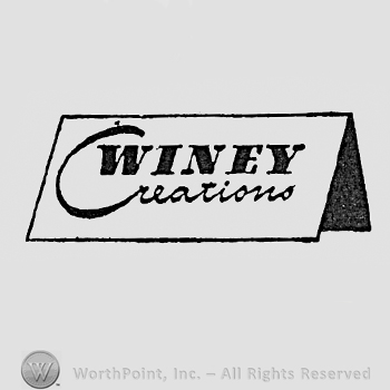 Words WINEY CREATIONS written on a label.
