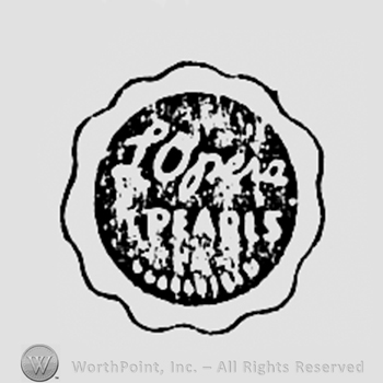 Words LOPERA PEARLS inside a circle.