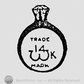 Words TRADE MARK and 14k inside a ring.
