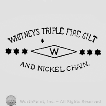 Letter W inside a diamond; words WHITNEYS TRIPLE FIRE GILT written above, and words AND NICKEL CHAIN written bellow.