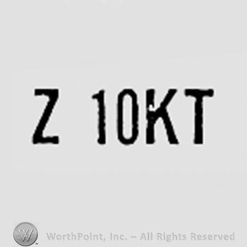 Letter Z, number 10 and letters KT.