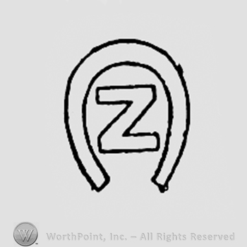 Letter Z inside a horseshoe.