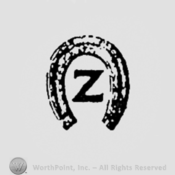 Letter Z inside a horseshoe.