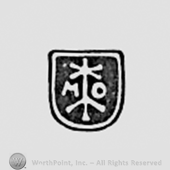 Shield shape with initials MO inside.