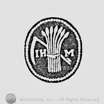 Oval with scythe and initials J H M.