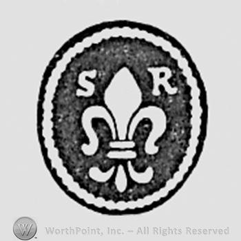 Oval with fleur de lis inside and initials S R.