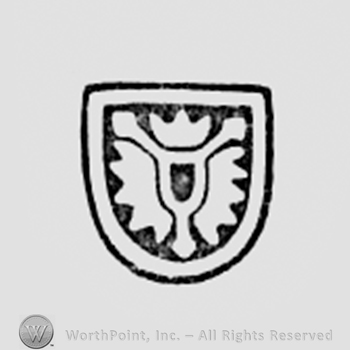 Shield shape with three crowns inside.